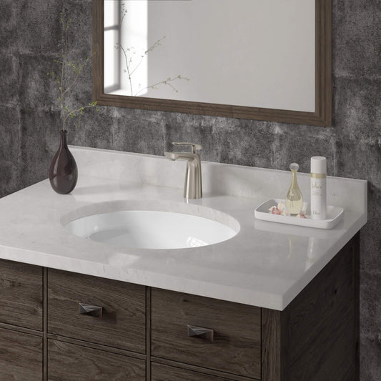 Enhancing the bathroom's aesthetic appeal, an undermount sink paired with a faucet adds to its beauty.